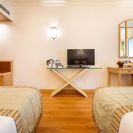 The Orchid Hotel Mumbai Vile Parle Exterior photo A room at the hotel