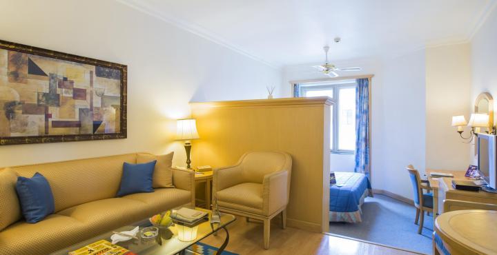 The Orchid Hotel Mumbai Vile Parle Exterior photo A typical room at the hotel